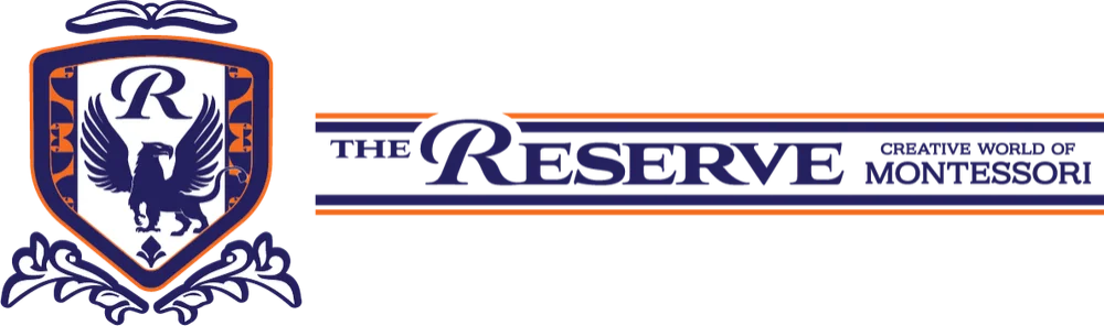 Brand logo featuring a blue shield crest with an eagle and an R at the top, orange border and decorative elements, followed by the word 'THE RESERVE' in blue with orange accents.